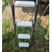 Treads for telescopic ladders